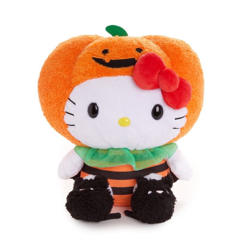 A plush of Hello Kitty in an orange pumpkin Halloween costume