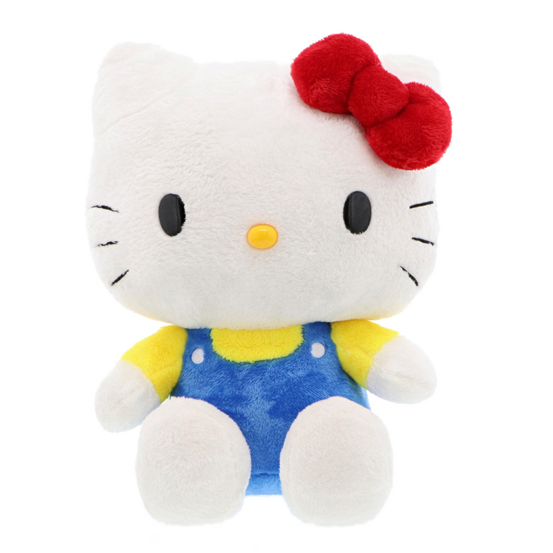 A Hello Kitty plushie wearing a yellow shirt and blue overalls